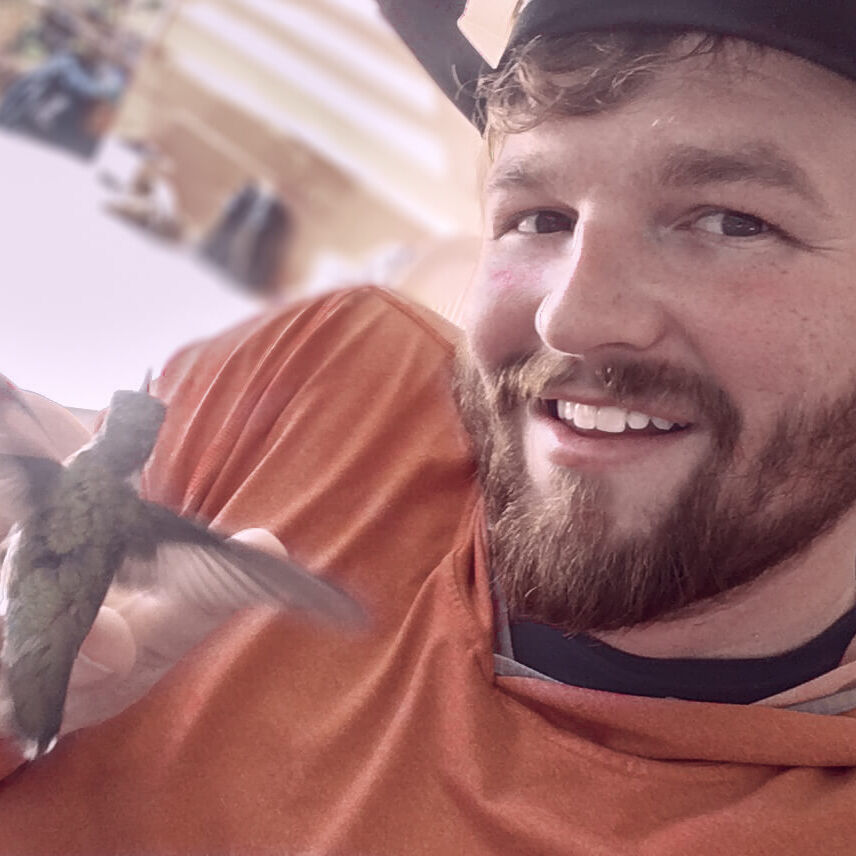 Zach with hummingbird